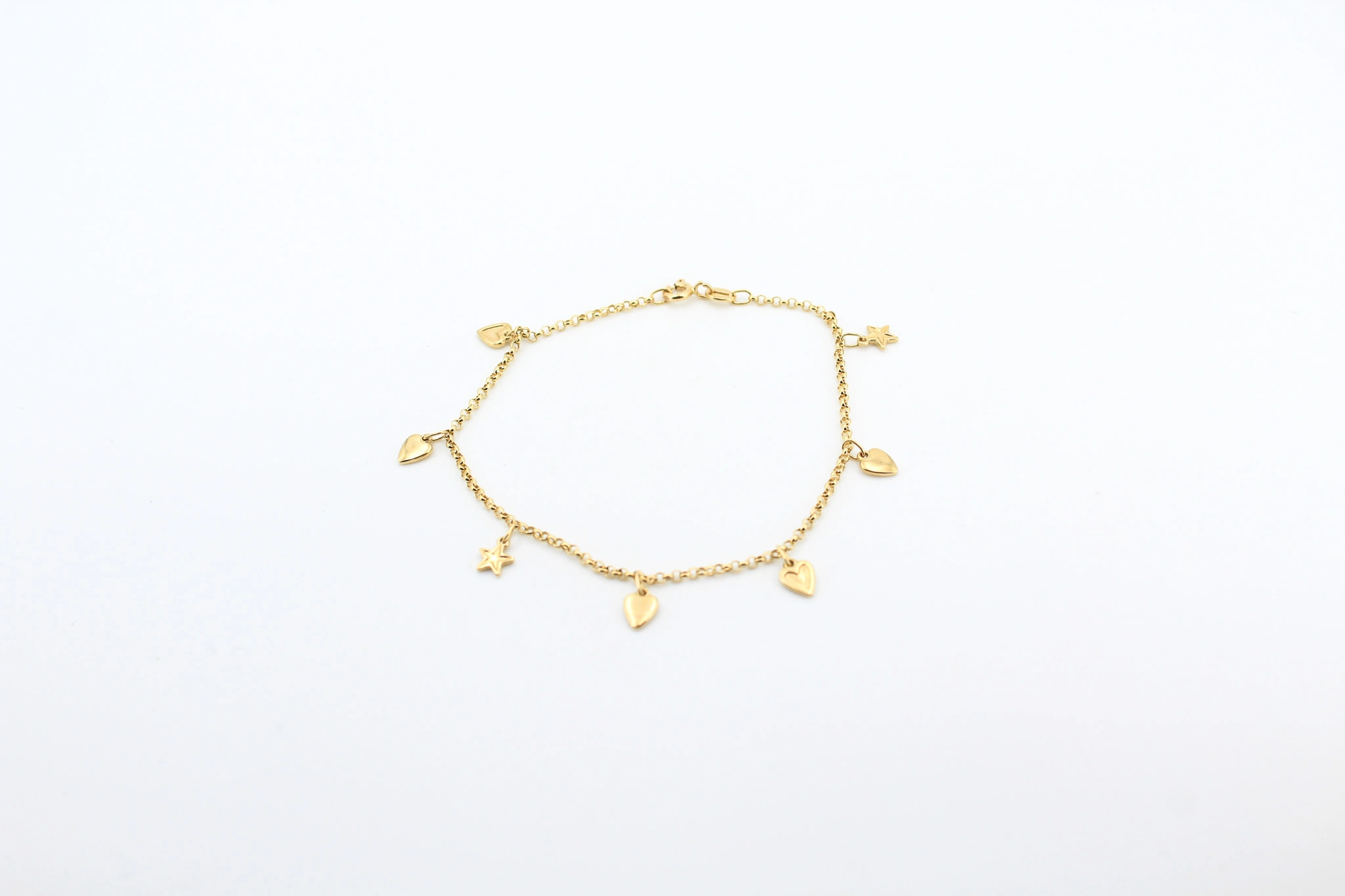 Pulsera de oro con corazones y estrellas 18K