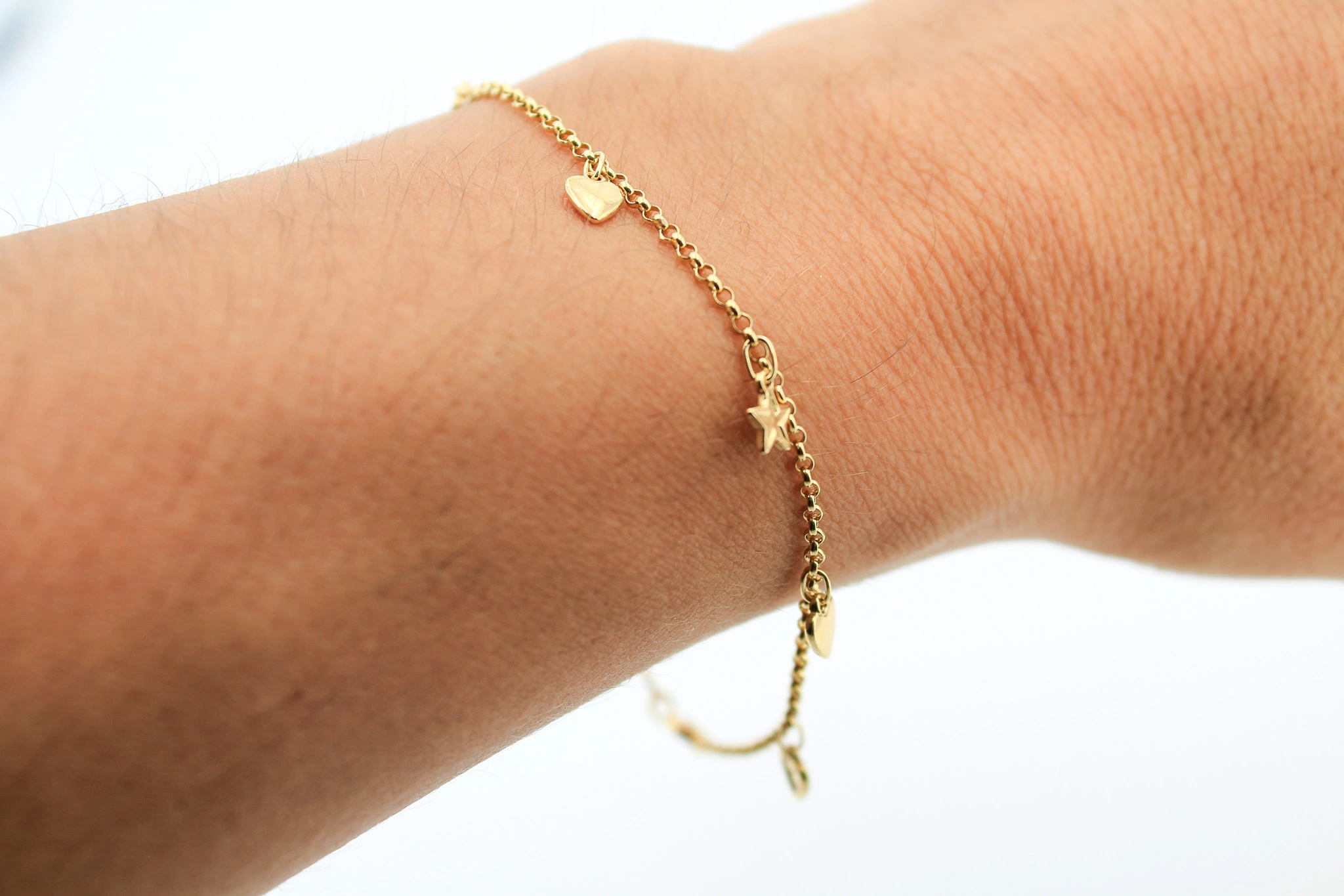 Pulsera de oro con corazones y estrellas 18K — foto 3