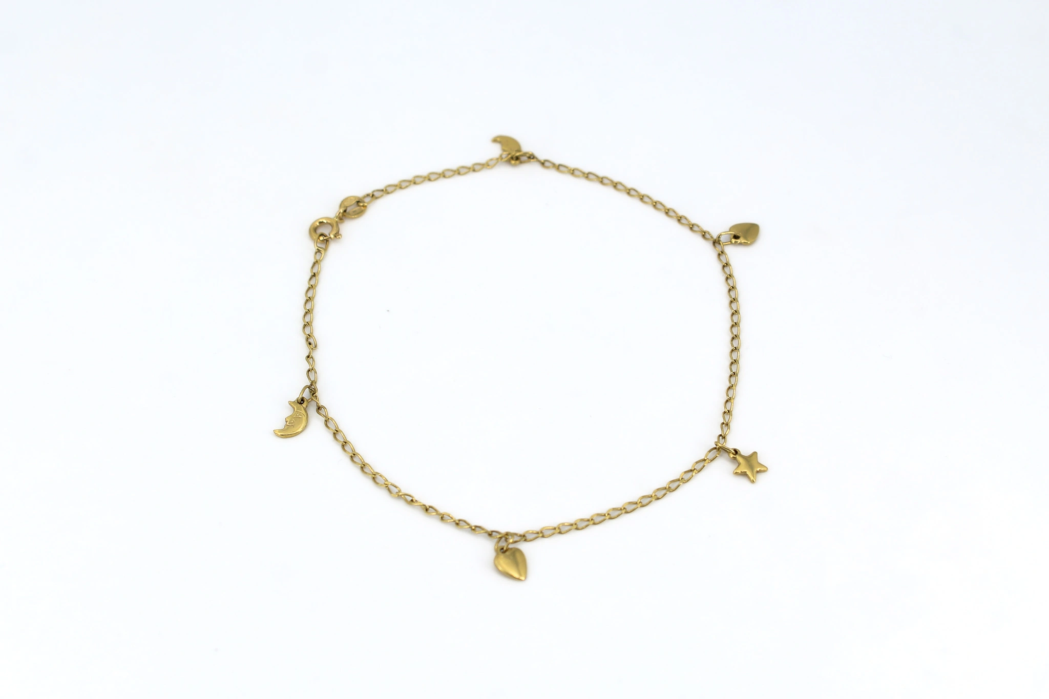 Pulsera de oro 18K con dijes de luna, estrella y corazones