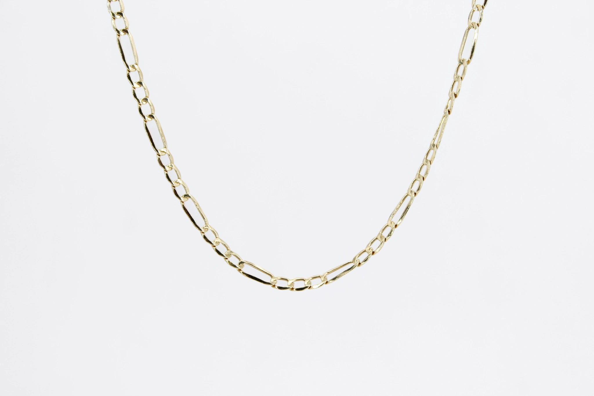 Cadena Figaro de oro 18K