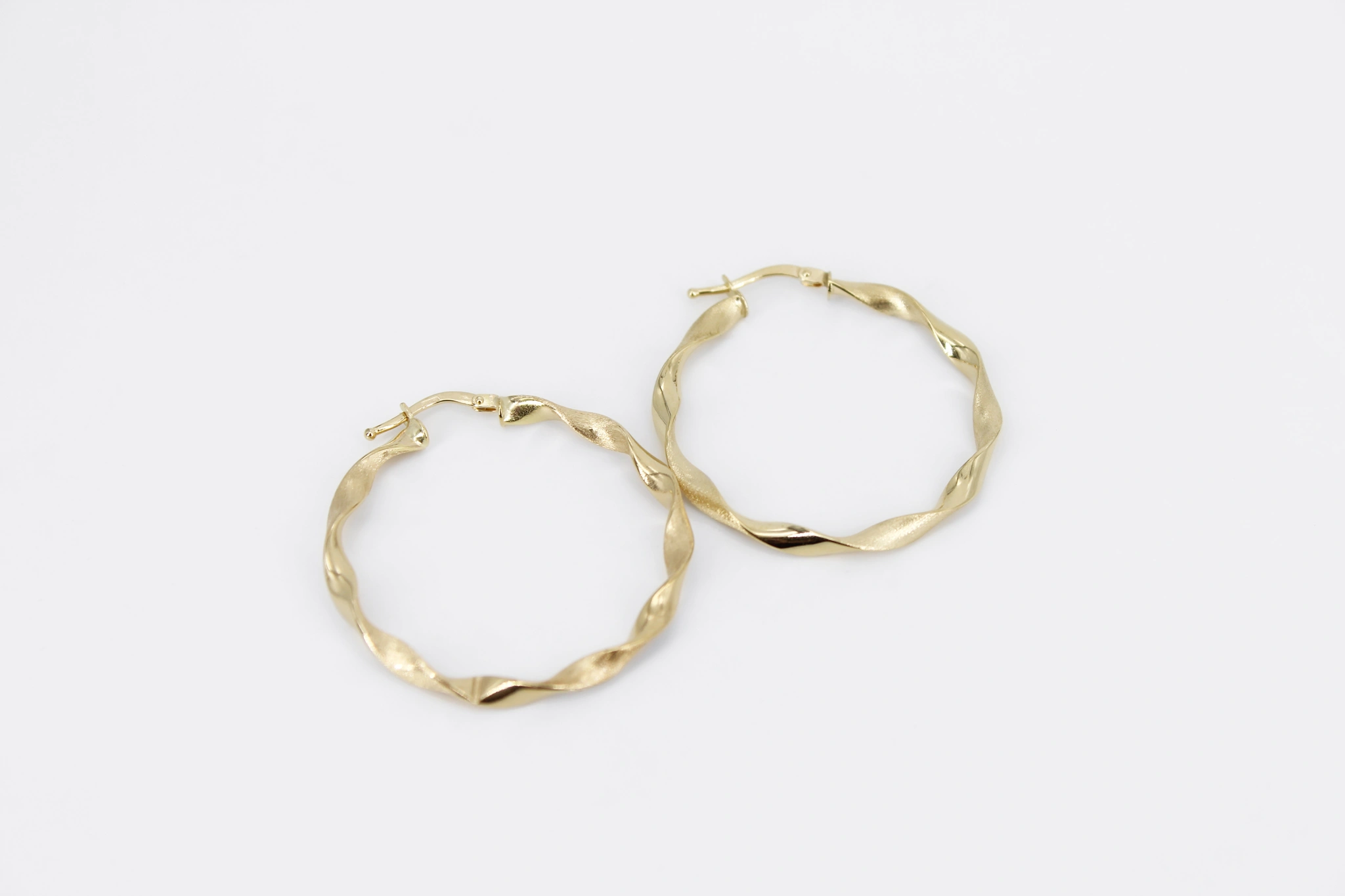 Pendientes aro trenzado de oro 18K