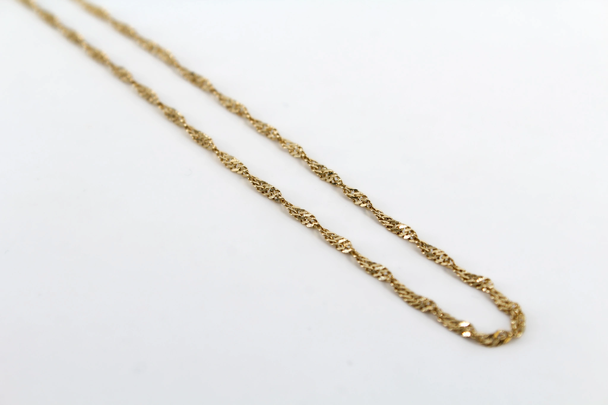 Cadena de oro Singapur 18K