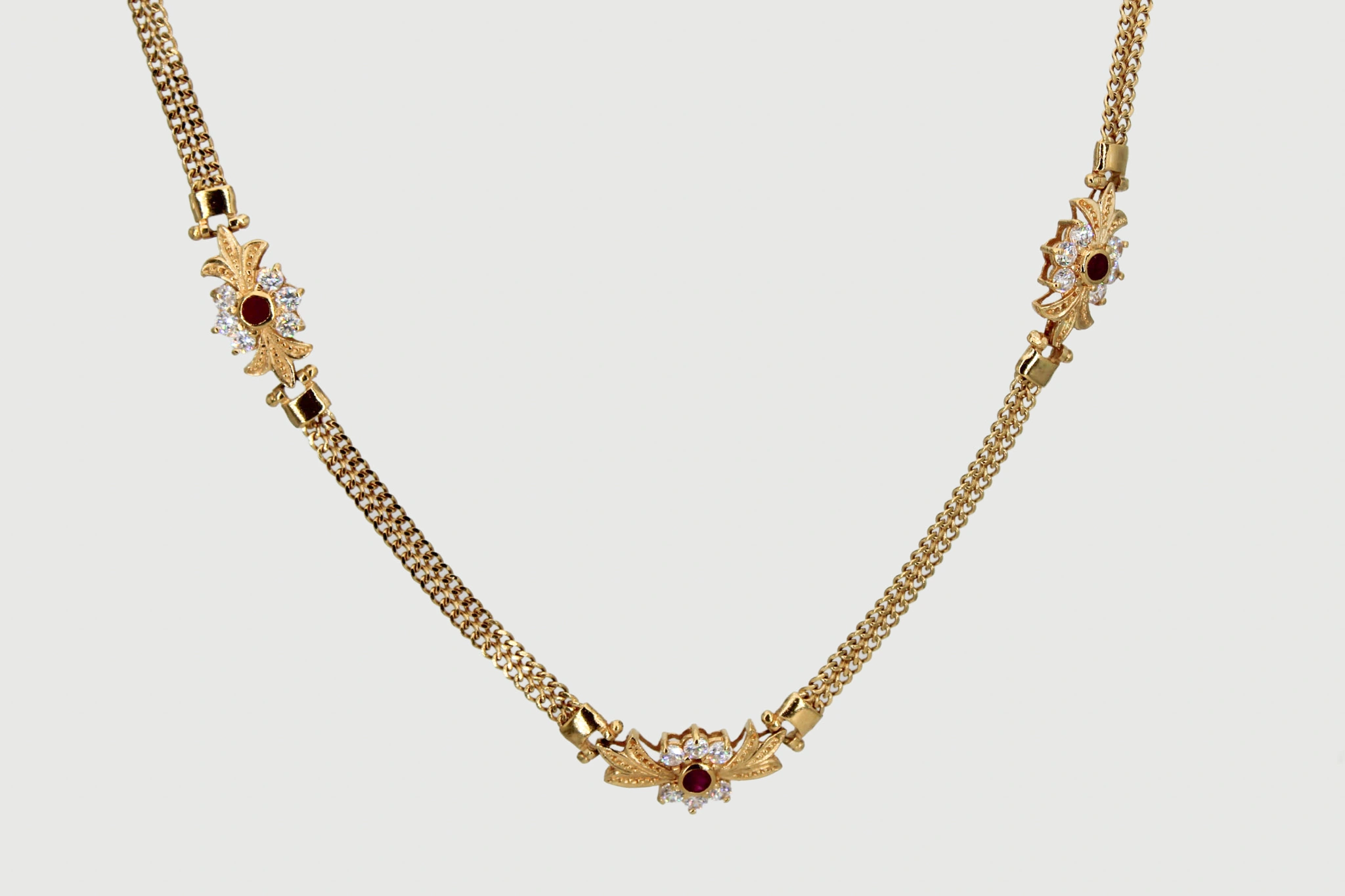 Gargantilla de oro de 18k con piedras de color