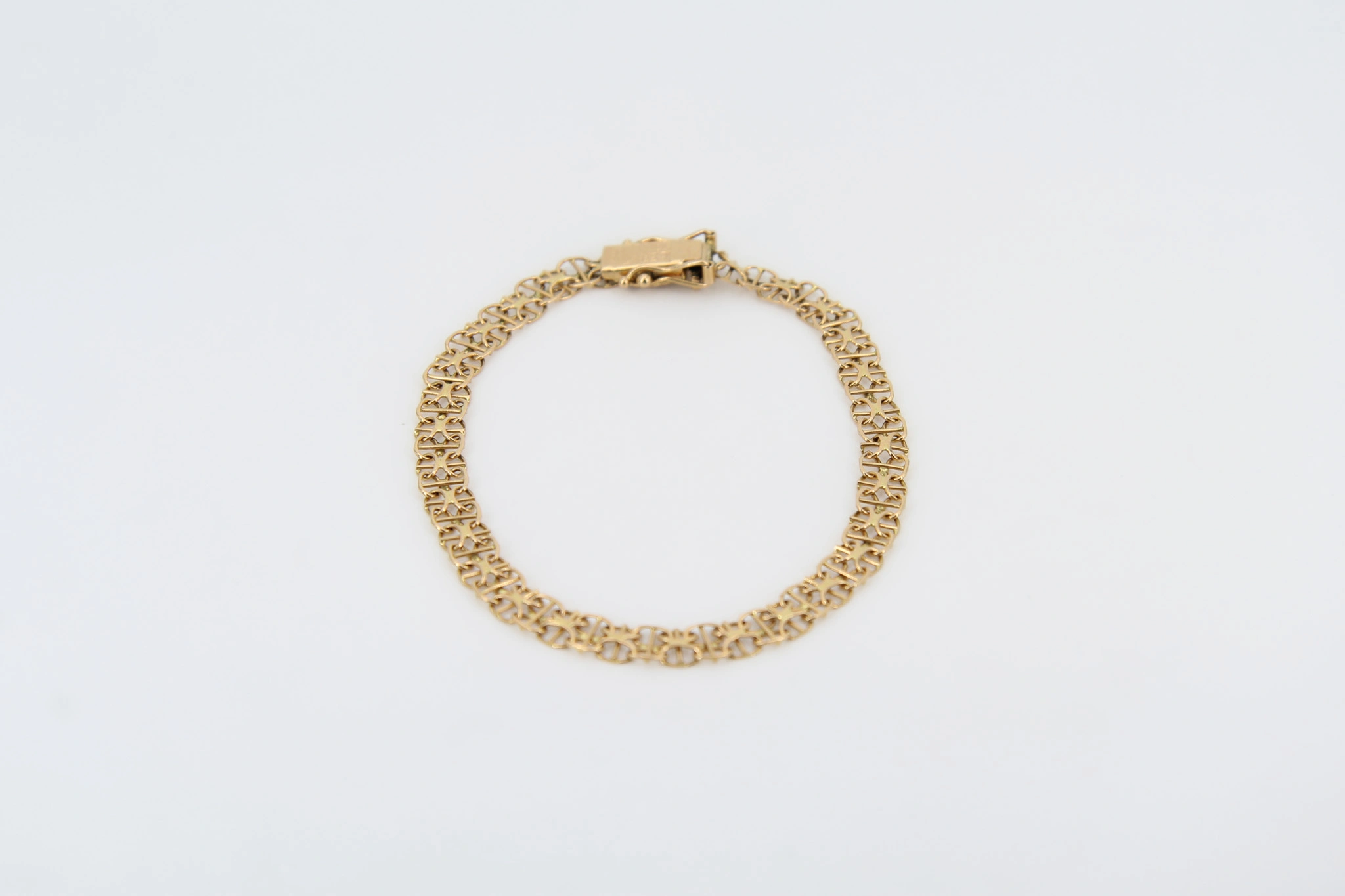 Pulsera de oro eslabones calados 18K