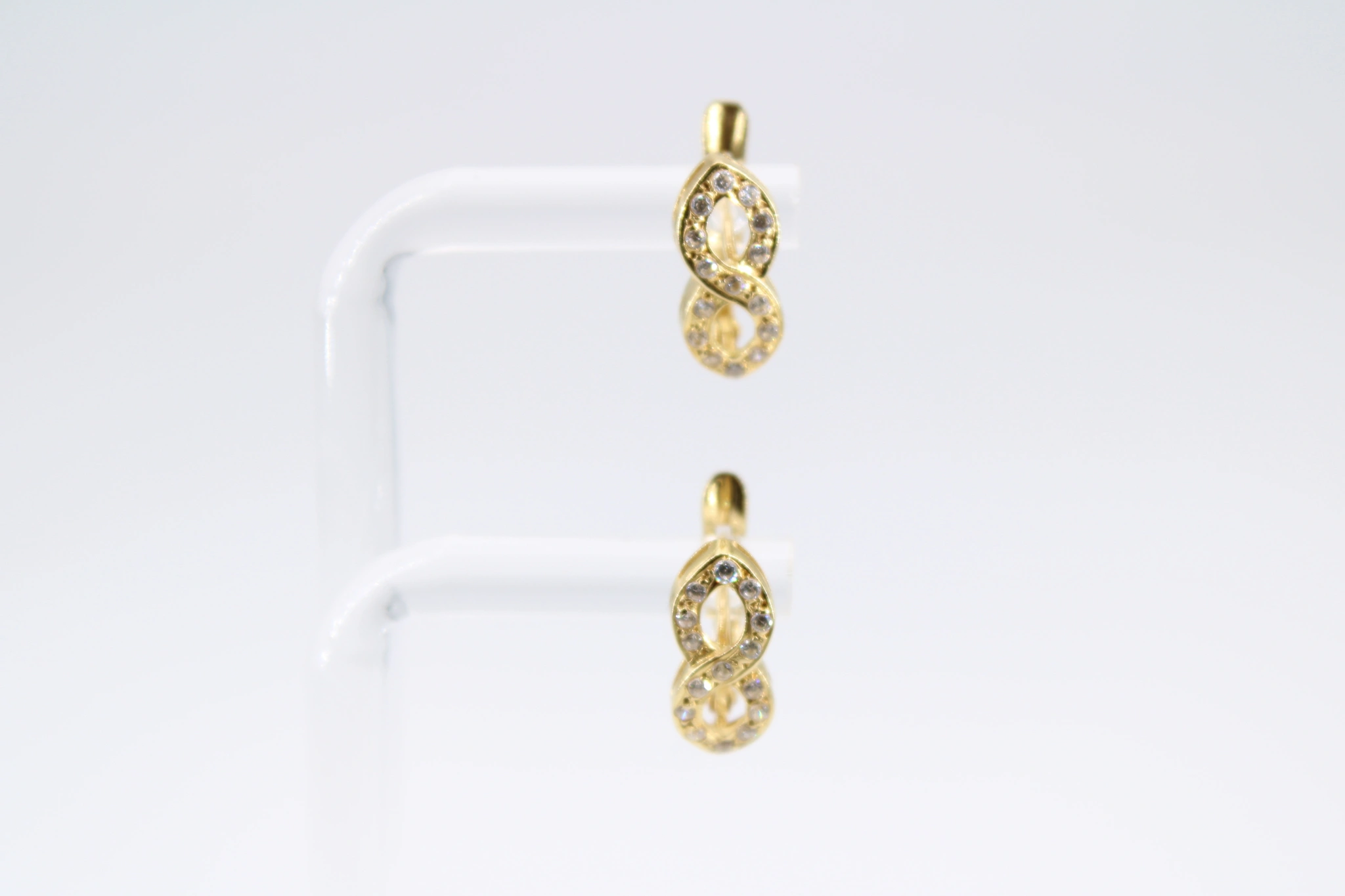 Pendientes de oro 18k con infinito y circonitas — foto 3
