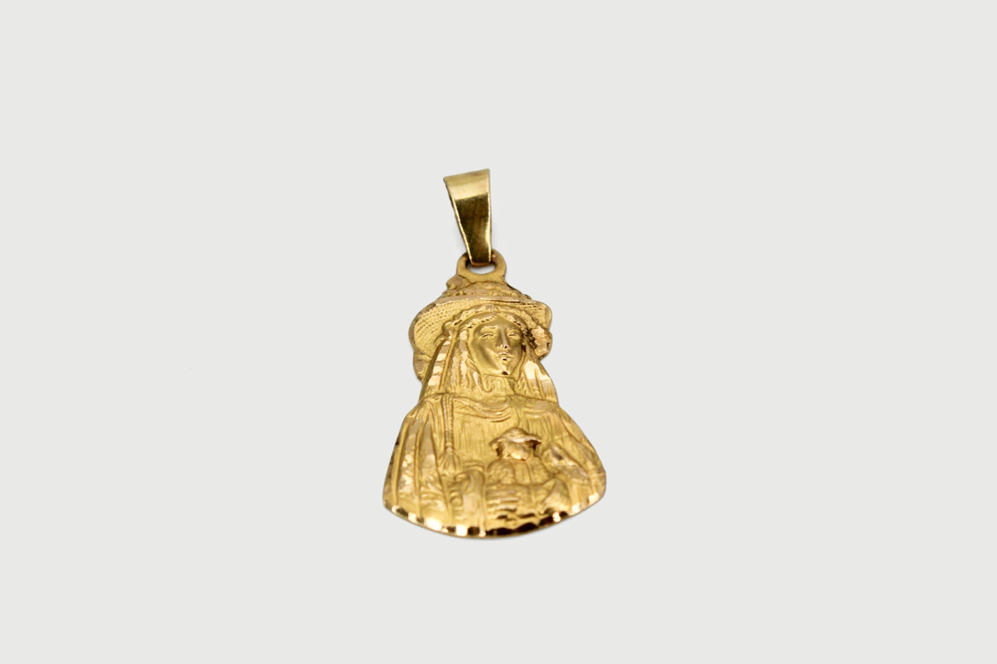 Medalla de la Virgen con el Niño en oro de 18k
