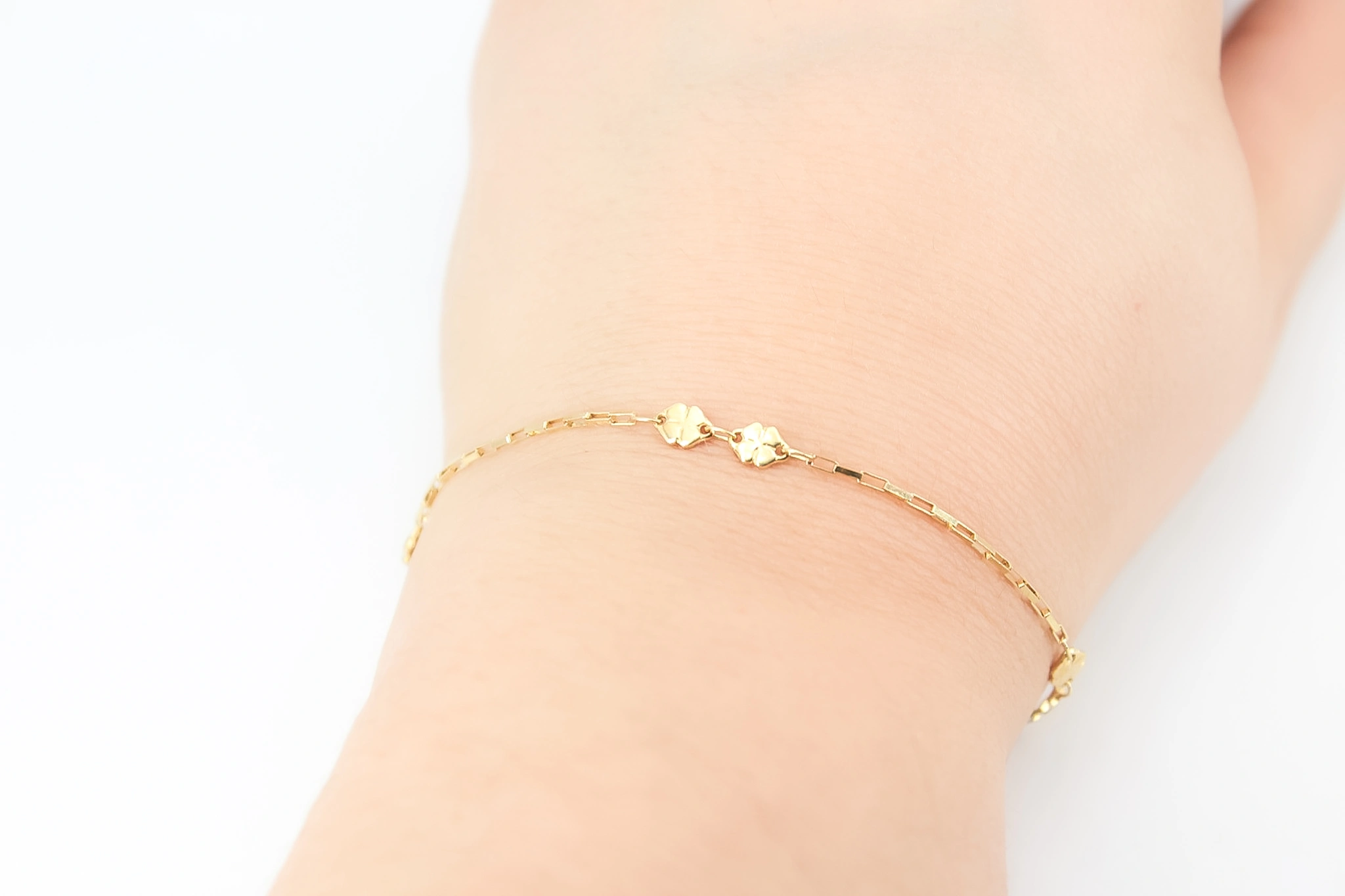 Pulsera de oro con tréboles 18K — foto 3