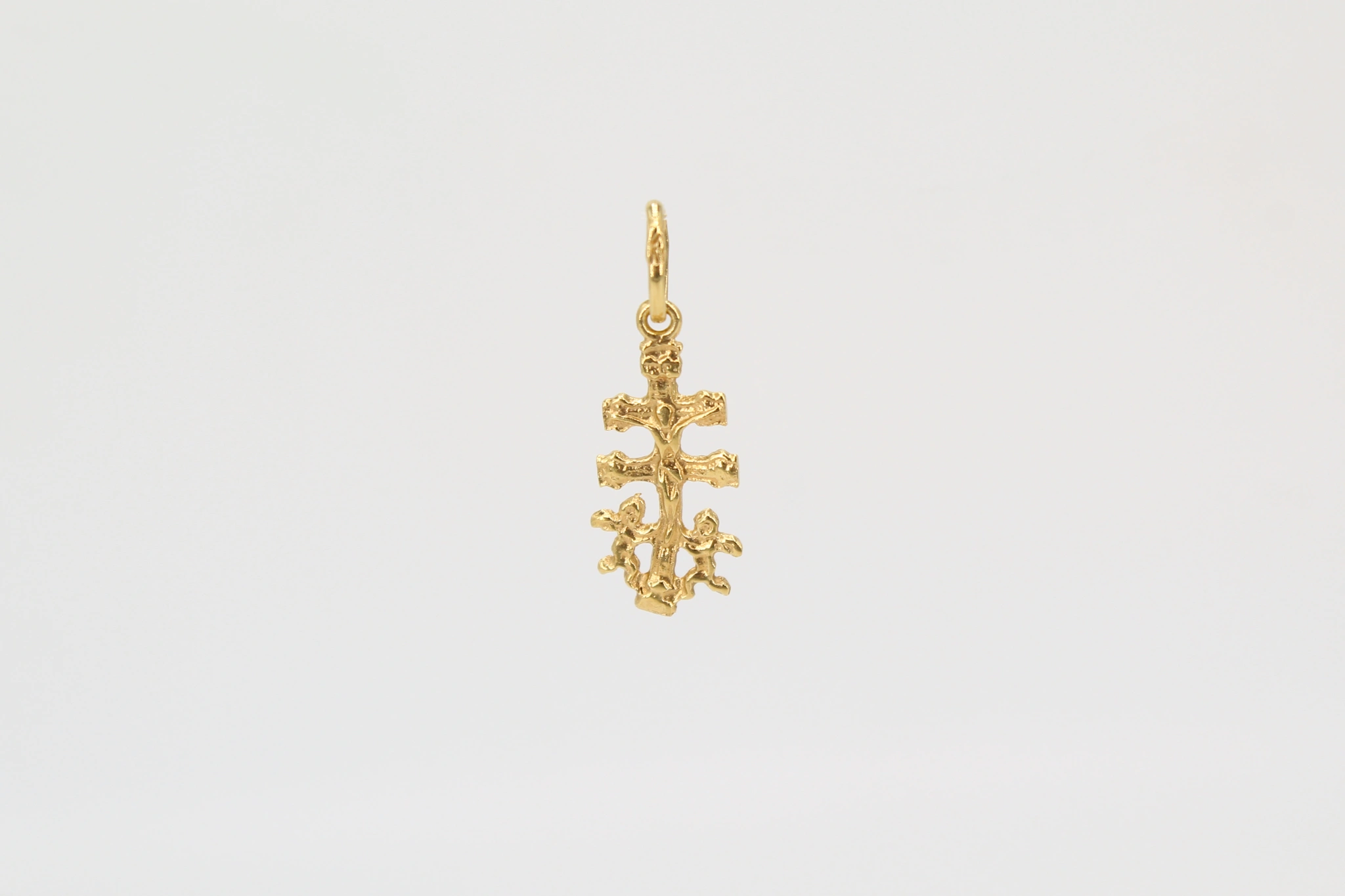 Cruz de oro de 18k con motivos múltiples — foto 3