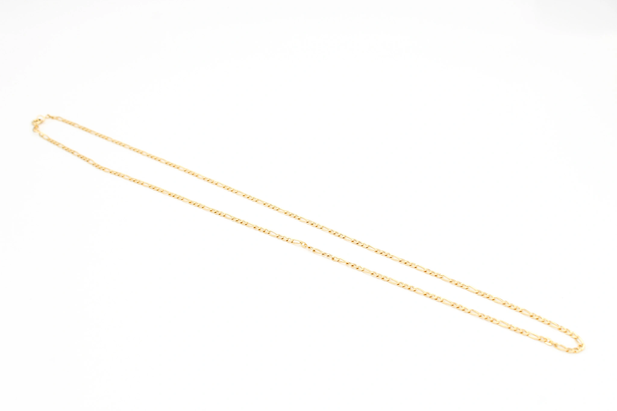Cadena fígaro de oro 18K